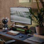 computer on a desk in a bedroom